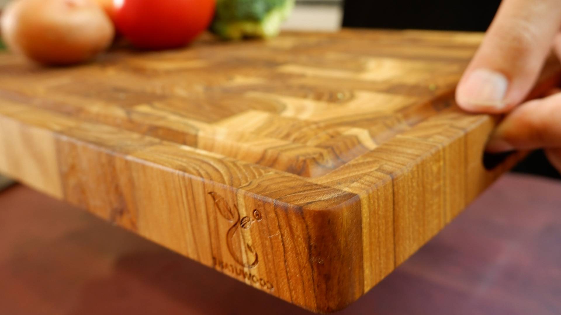 High-quality teak cutting board made from sustainable materials, offering durability and eco-friendliness for modern kitchens.