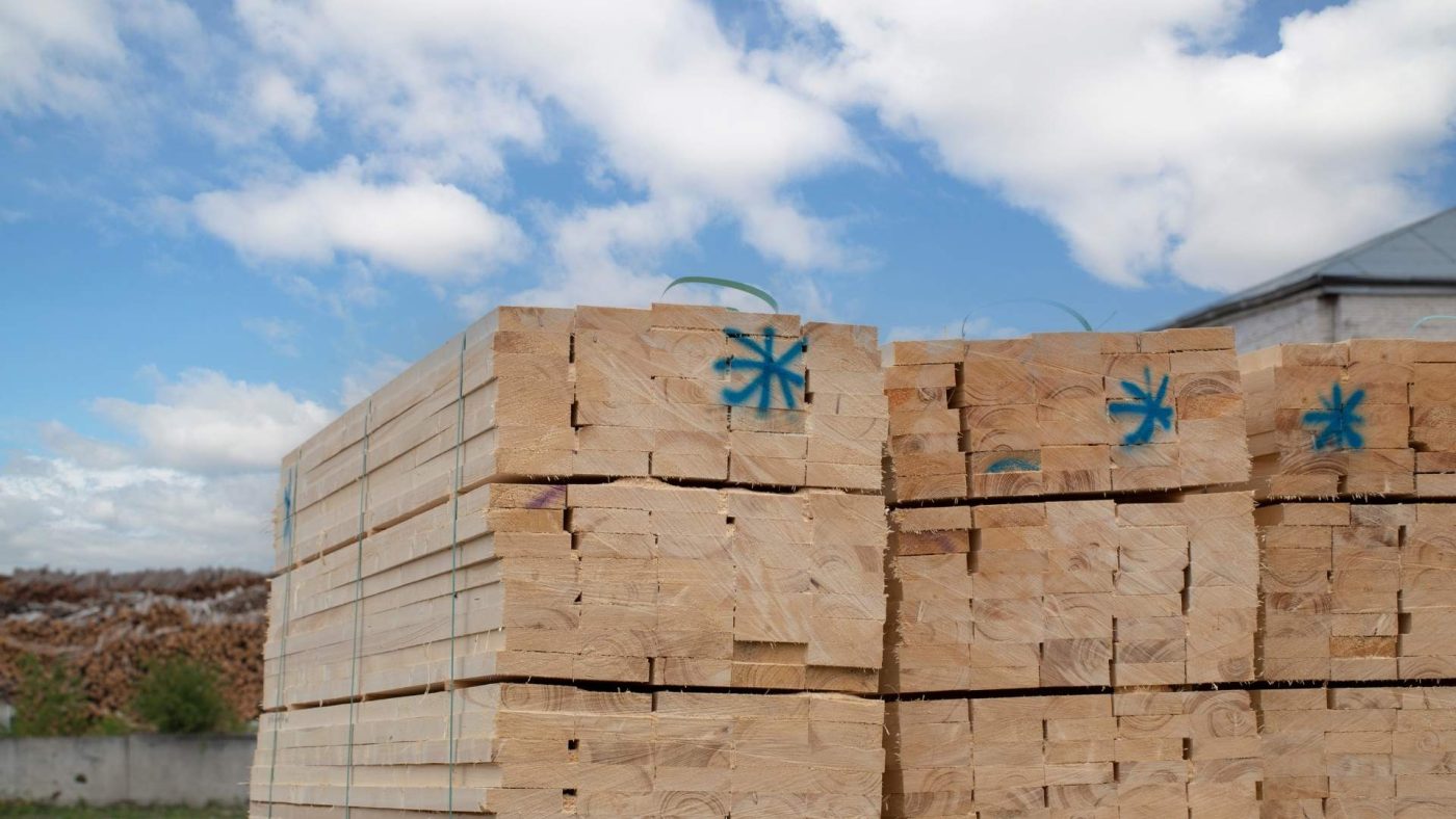 Large-scale wooden houseware production in a Chinese factory, emphasizing cost efficiency
