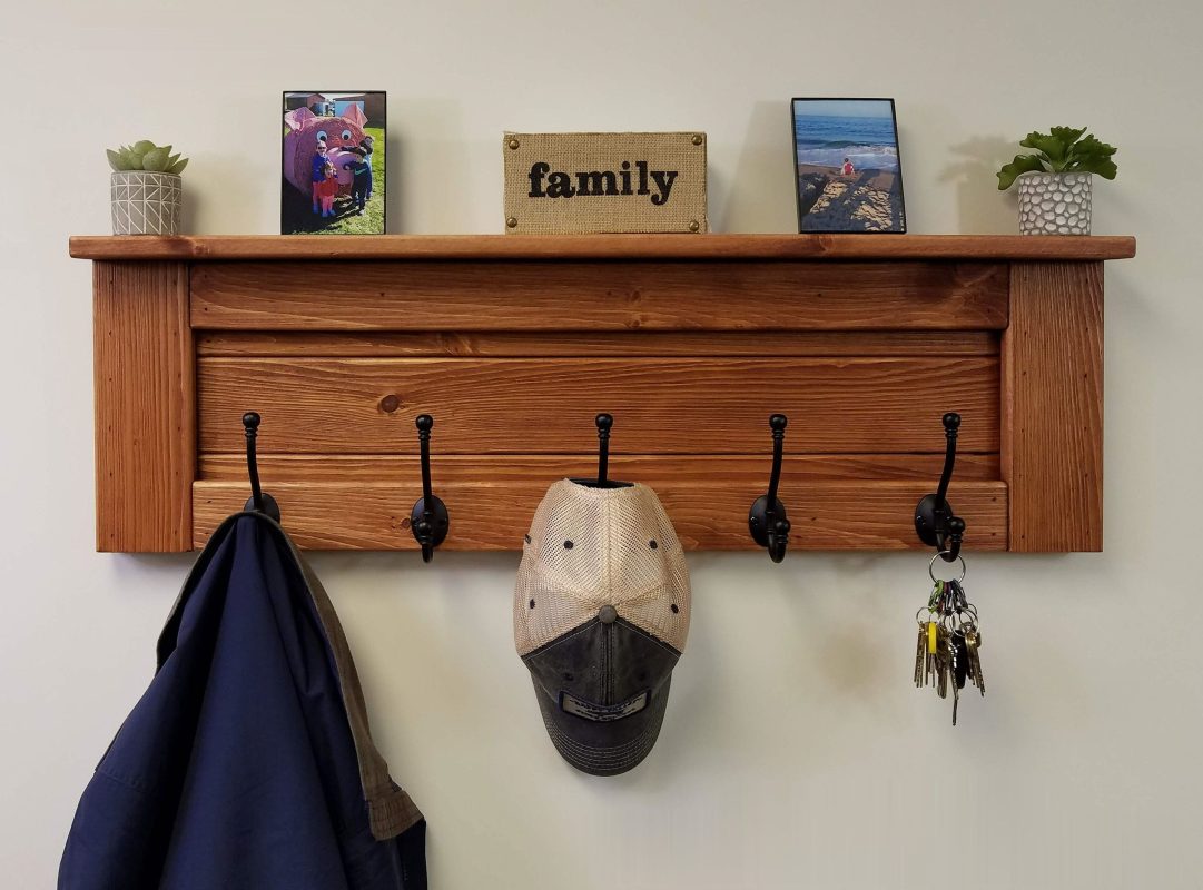 Wooden wall hangers add warmth and texture to modern interiors