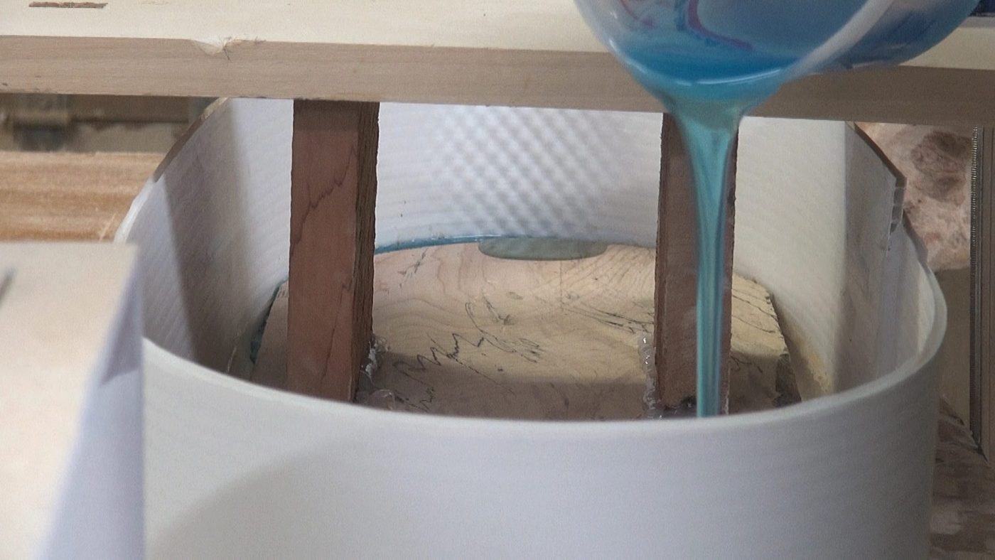 Epoxy resin is carefully measured and mixed