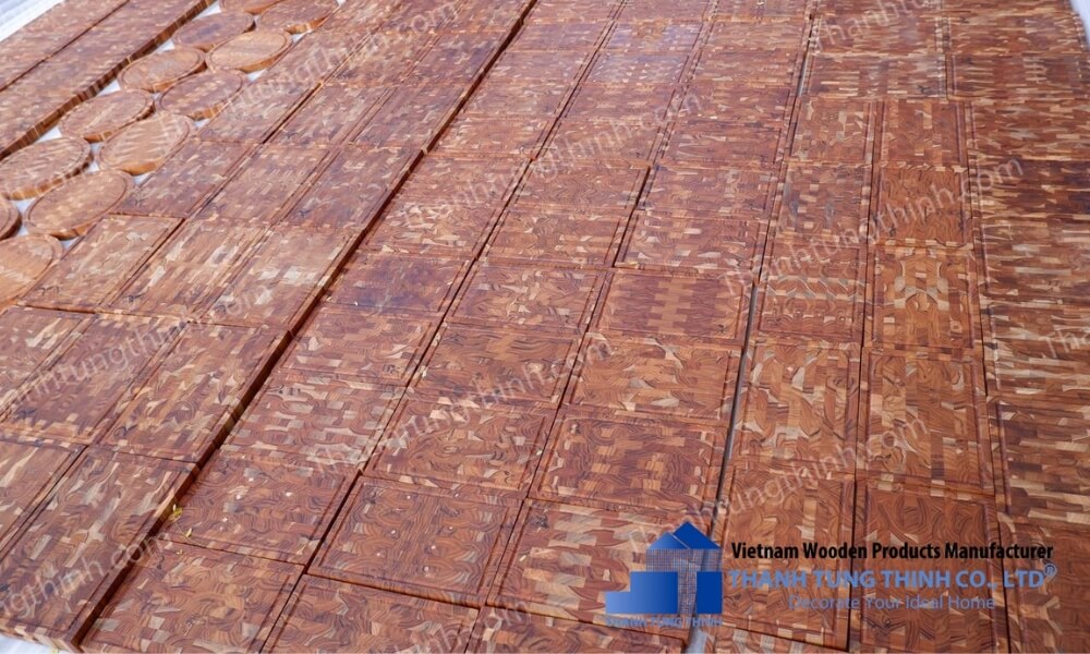 Stacks of Bulk End Grain Cutting Boards for wholesale.