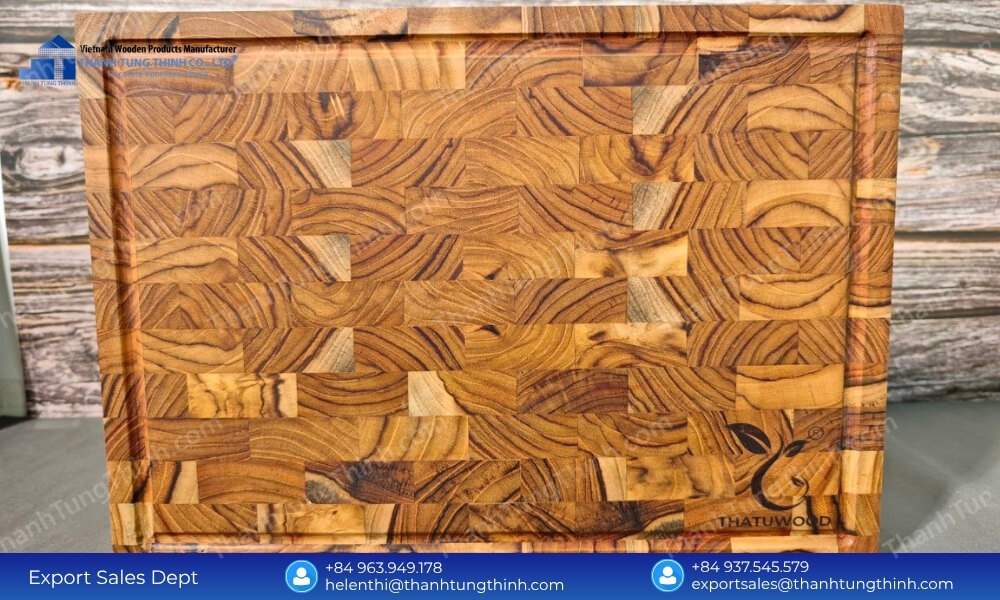 A high-quality end-grain kitchen block with rich wood grains from a trusted teak wood cutting board wholesale manufacturer