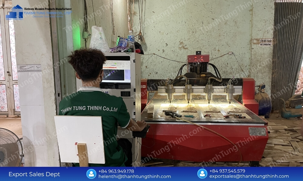An industrial factory technician monitoring multi axis machinery to execute a custom wholesale odm wooden jewelry box production contract