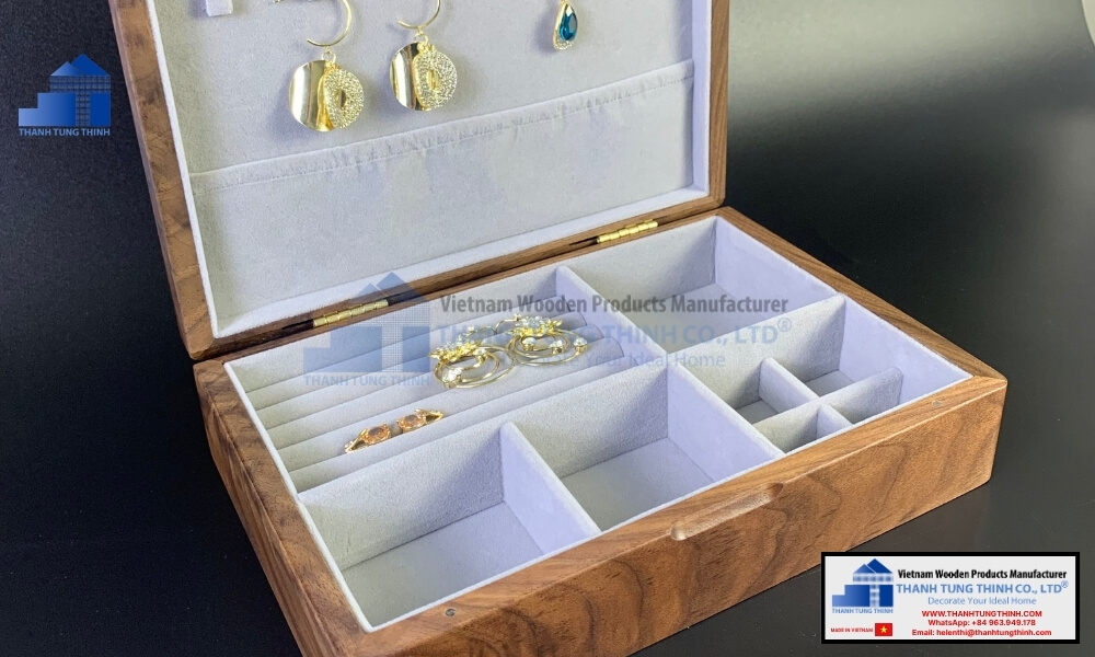 An opened walnut custom storage unit showcasing wooden jewelry boxes large inner capacity lined with scratch protection velvet