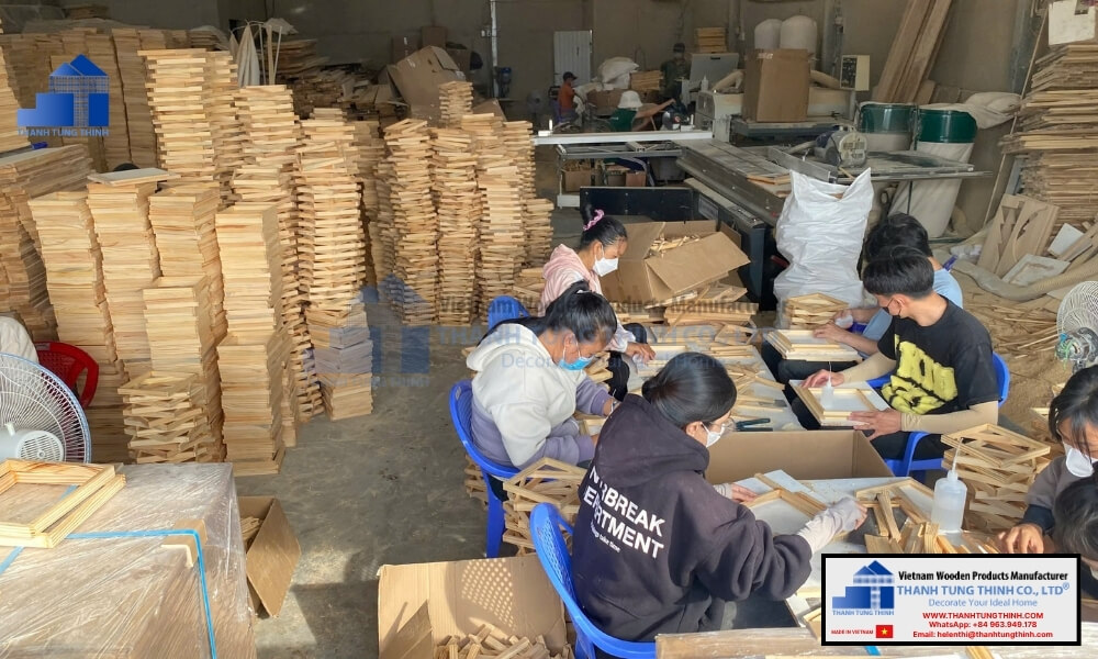 Factory workers assembling wooden components for bulk black wooden jewelry box production