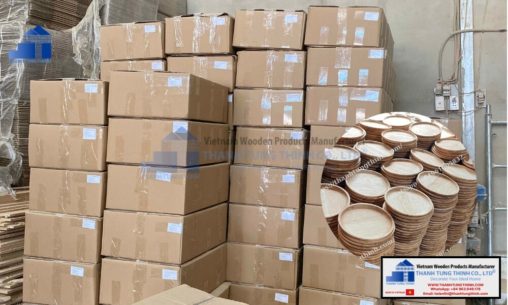 Large stacks of wholesale carton boxes containing wooden tableware products ready for shipment at a bulk wooden plates factory