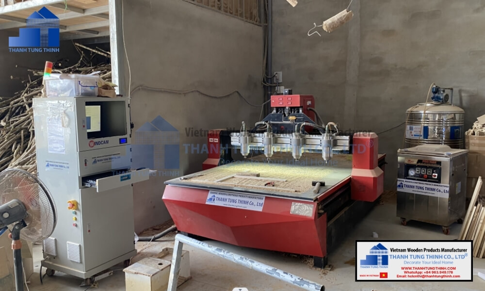 An industrial automated CNC woodworking machine operating in a factory workshop to precision shape kitchenware dinnerware items