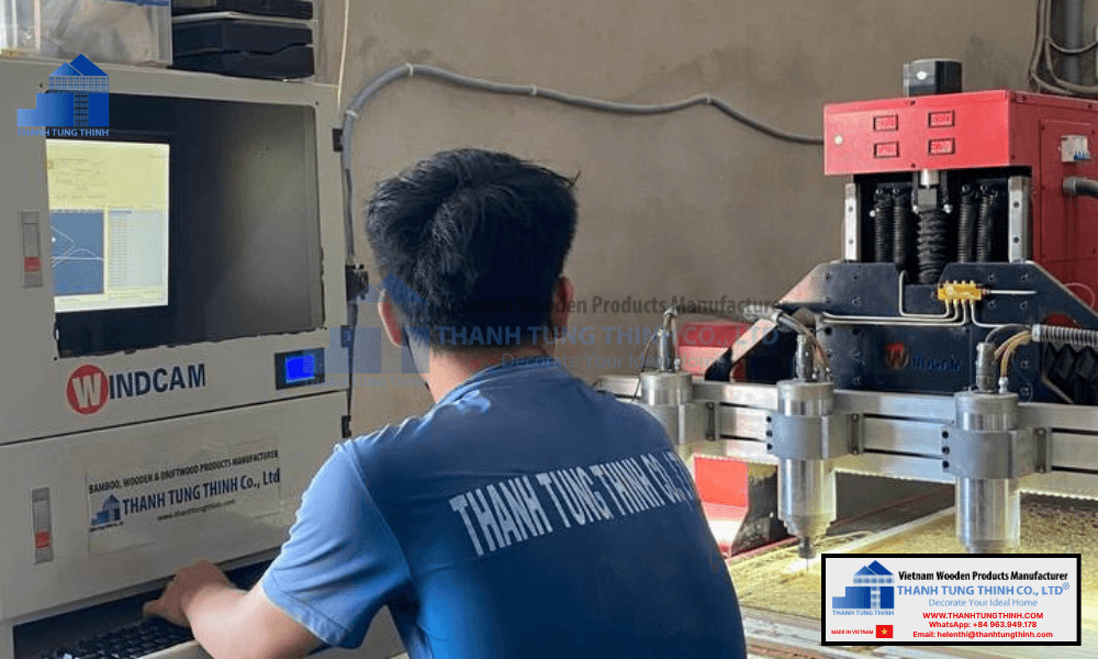 technician operating modern cnc machine to craft high quality wooden jewelry boxes at thanh tung thinh factory