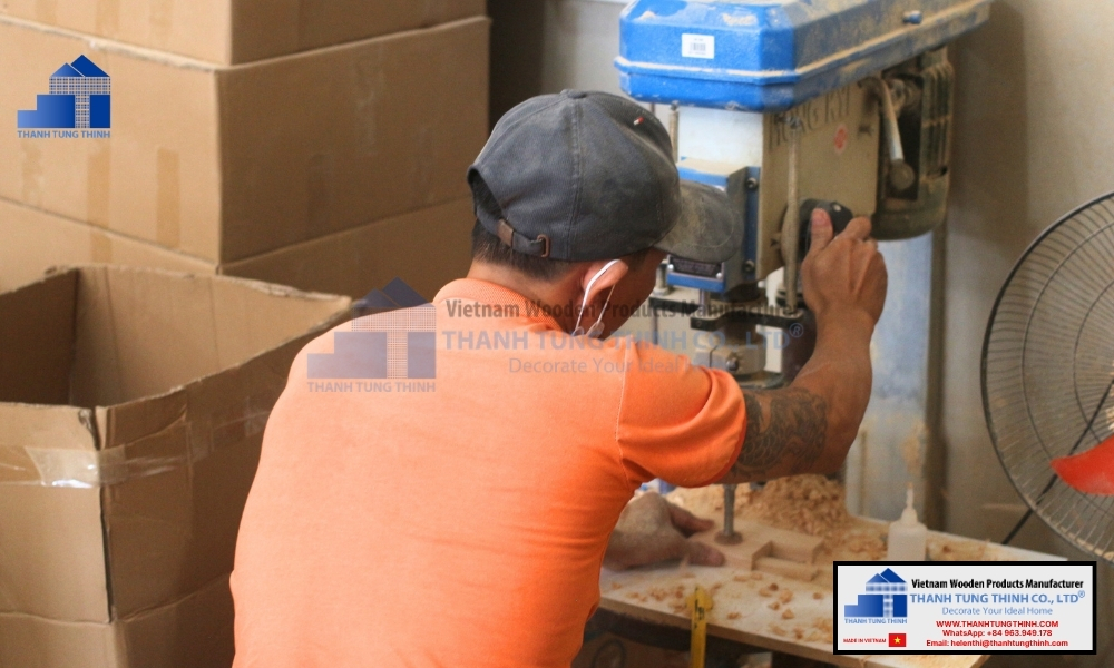 Skilled artisan crafting custom partitions for fancy wooden jewelry boxes at factory
