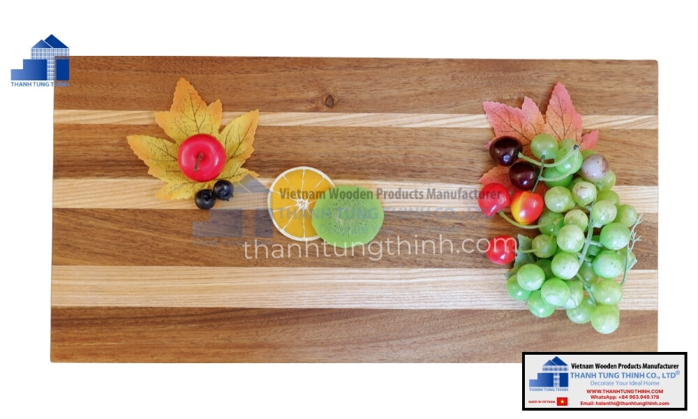 Fresh fruits displayed on a premium wooden surface representing the aesthetic aspect of the edge grain vs end grain cutting board selection